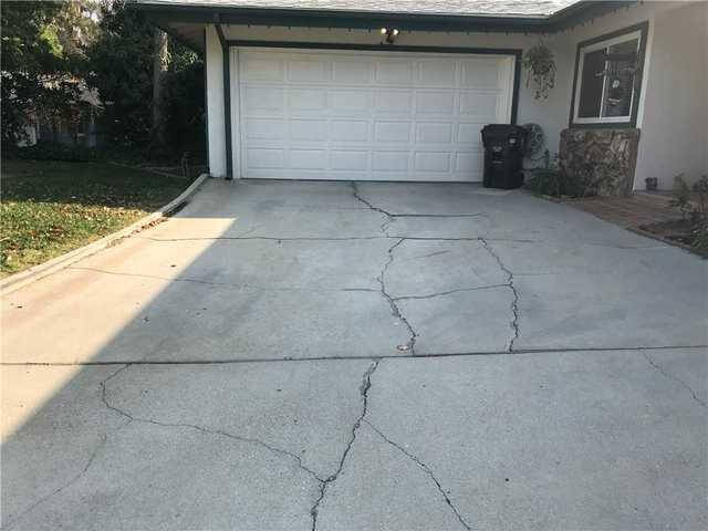 Should I Resurface or Replace My Asphalt Driveway
