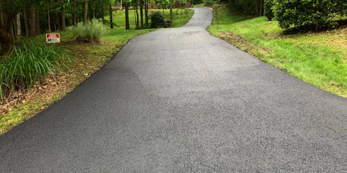 asphalt driveway paving over gravel