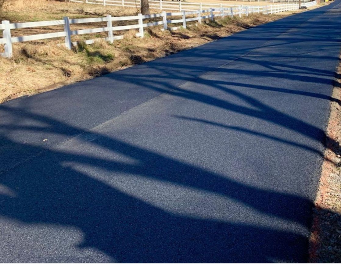 asphalt private road or pipe stem paving over gravel installed