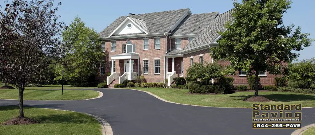 The Blacktop Revolution: Why Asphalt is the New Standard for Modern Driveways driveway standard paving